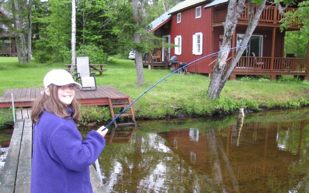Brigid fishing at camp on Chateaugay Lake